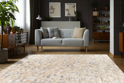 Luxe woonkamer met LaleeAvenue vloerkleed Lanvin in goud- en zilverkleurig hexagon-patroon, gecombineerd met moderne meubels.
