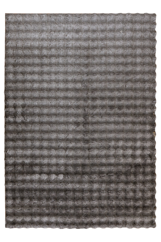 Bovenaanzicht van vloerkleed My Calypso in taupe – luxe structuur en speelse schaduwwerking zichtbaar in de textuur