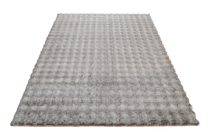 Vooraanzicht van het taupe My Calypso vloerkleed – stijlvol en modern ontwerp met 3D-effect