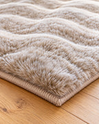 Detail van de zachte pool en rand van het Obsession My Calypso beige vloerkleed