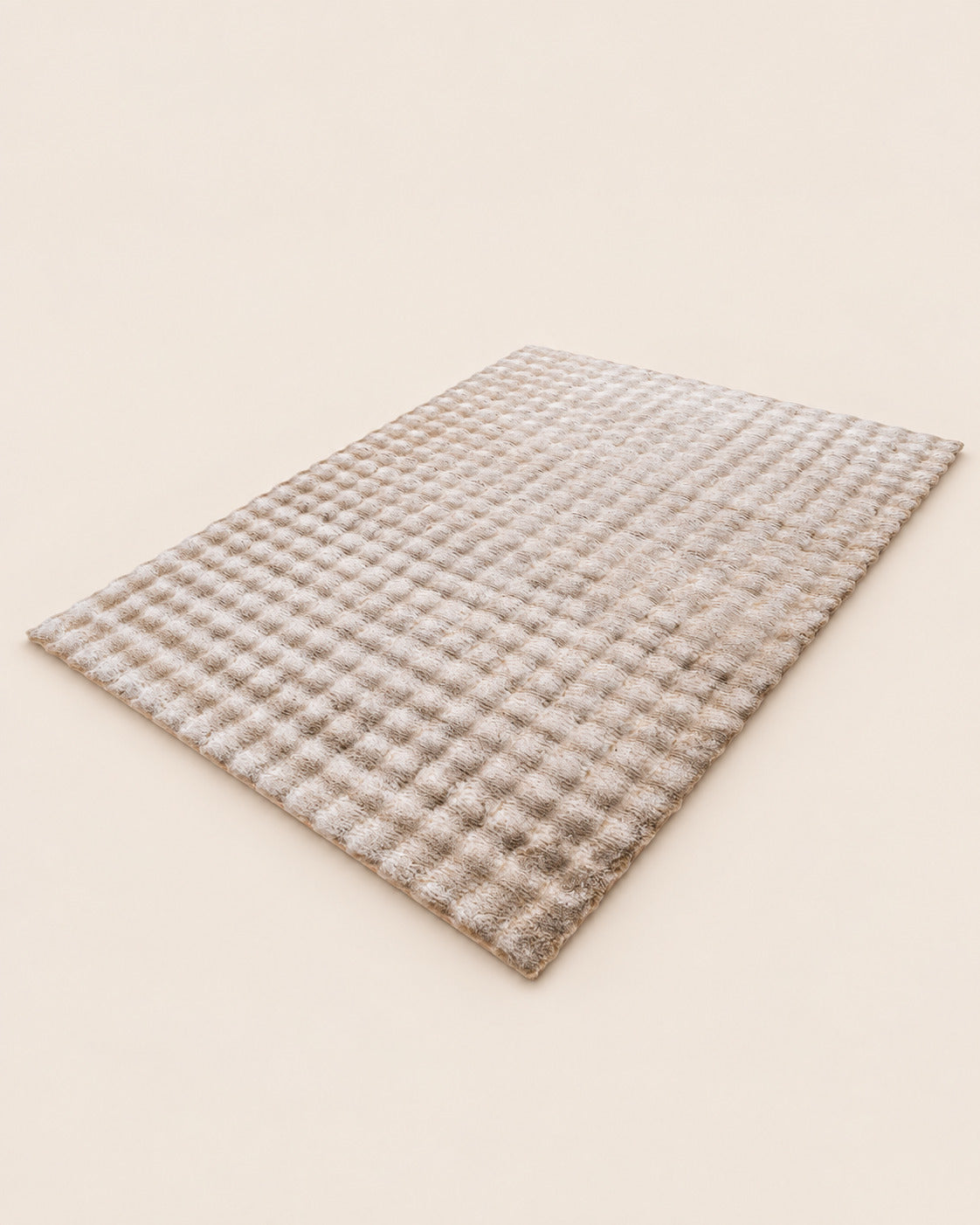 Obsession My Calypso beige vloerkleed schuin weergegeven